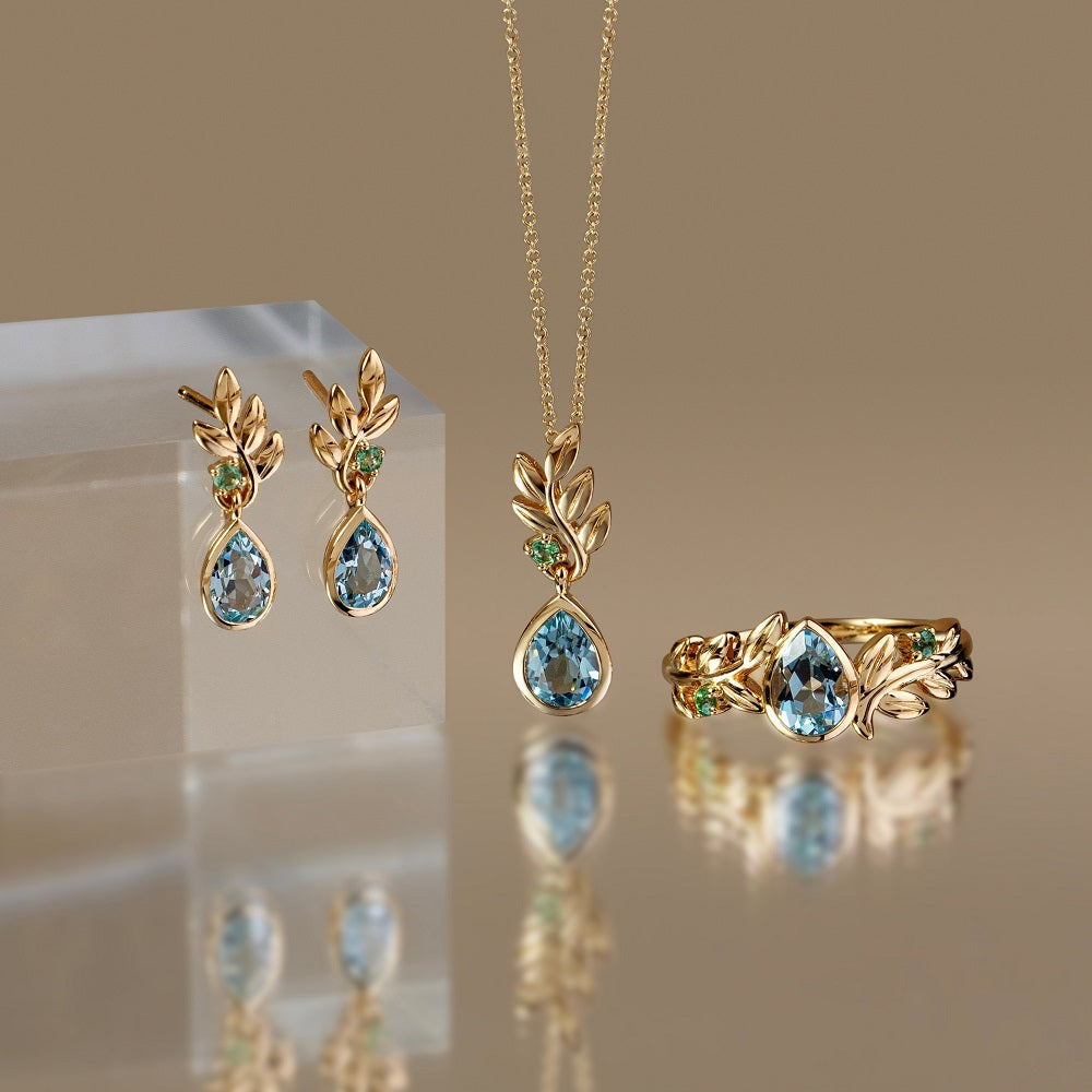 135P2116-01-9K-Yellow-Gold-Sky-Blue-Topaz-and-Tsavorite-Olive-Branch-Pendant