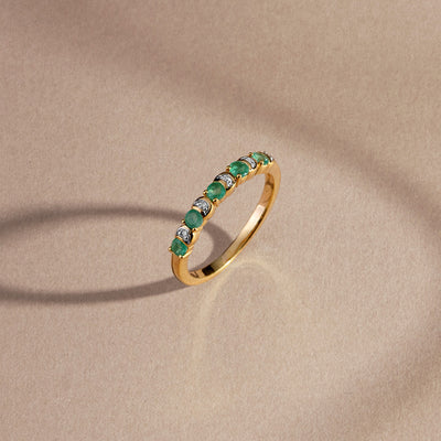 253R7011_02_925 Yellow Gold Plated Sterling Silver Round Emerald Criss Cross X Ring_Flat lay_1